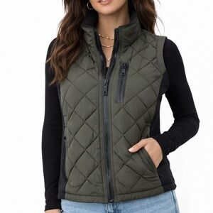 Andrew Marc green quilted vest with two zipper in front. Great condition. small
